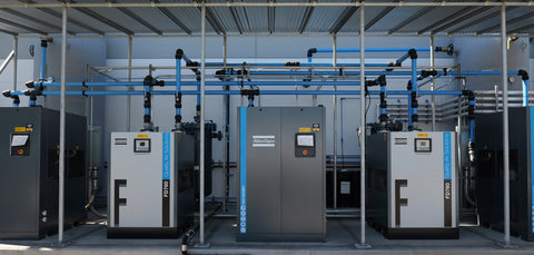 Industrial air compressor installation by Advanced Air & Vacuum
