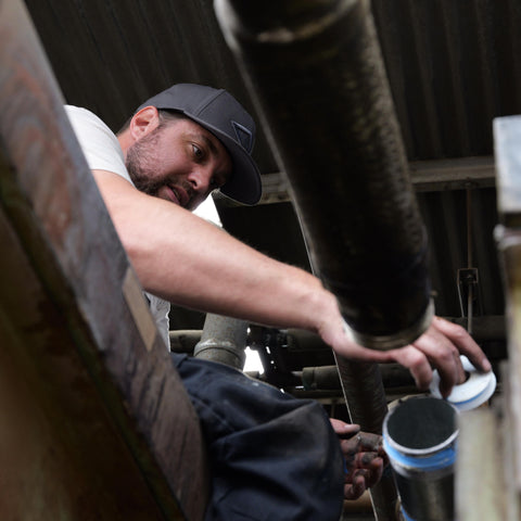 Advanced Air & Vacuum installation technician keeping compressed air operations running.