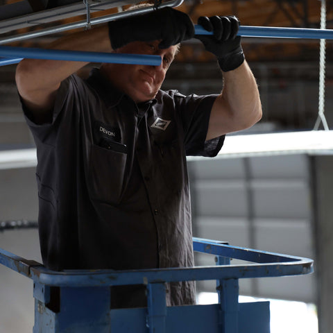 Aluminum compressed air piping installation completed by Advanced Air & Vacuum technician.