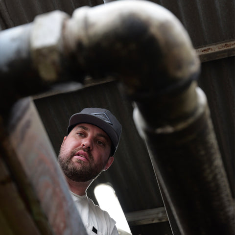 Close-up of compressed air piping installation with fittings and connections