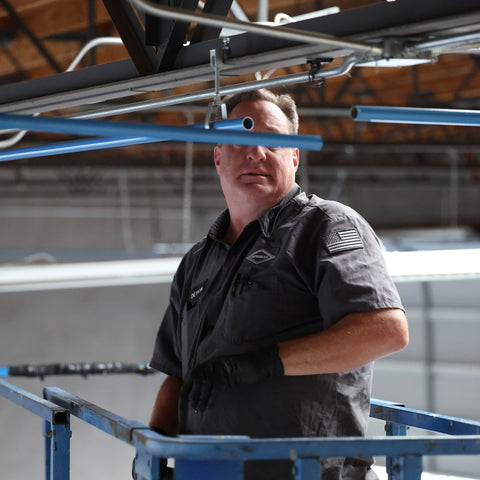 Compressed air piping layout installed across ceiling for facility-wide air distribution