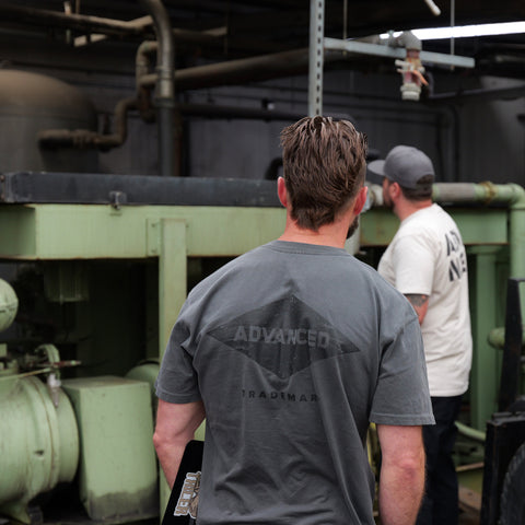 Heavy equipment placement for industrial air compressor system installation