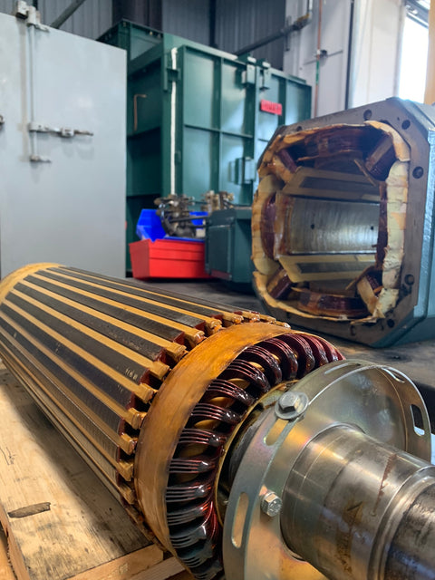 Industrial motor rotor and stator repair close-up inside Advanced Air & Vacuum’s motor rebuild shop.