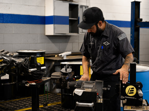 Advanced Air & Vacuum technician servicing a Pro-Cut brake lathe for automotive repair shop equipment support in El Centro, CA.
