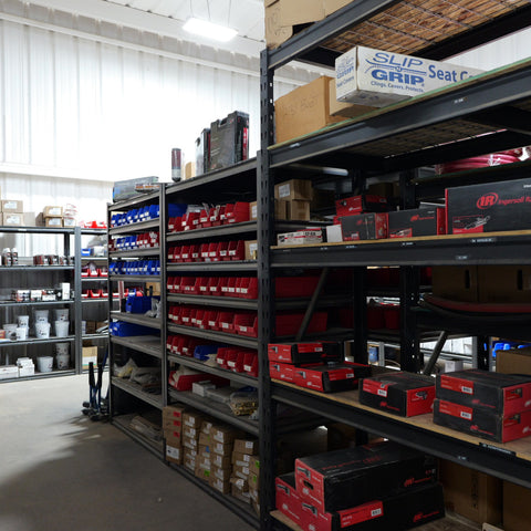 Stocked air compressor parts shelves at Advanced Air & Vacuum’s El Centro Parts Department.